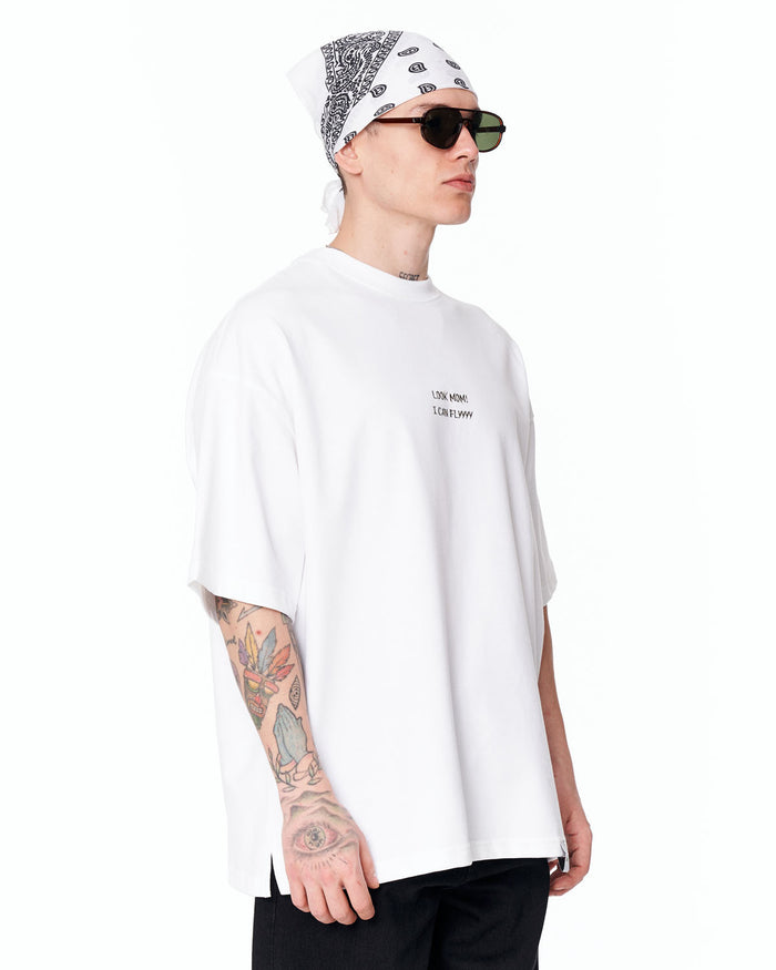 Look Mom Text Print Oversized White T-Shirt styled with washed grey denim