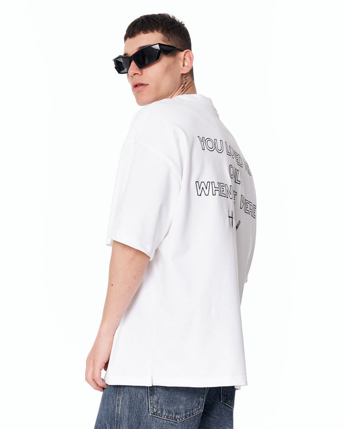 Loved Me Text Print Oversized White T-Shirt styled with blue denim jeans