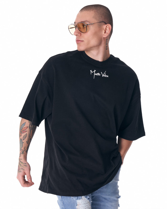 Martin Valen men's black half-sleeve T-shirt, three-quarter left view showing centered white logo