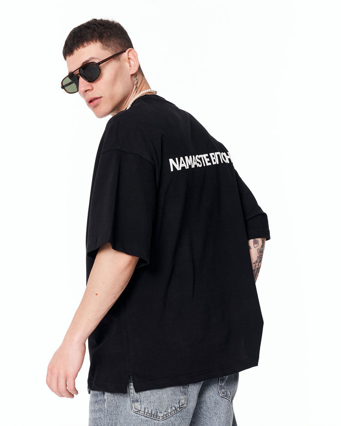 Namaste Streetwear Oversized Black T-Shirt styled with light blue denim
