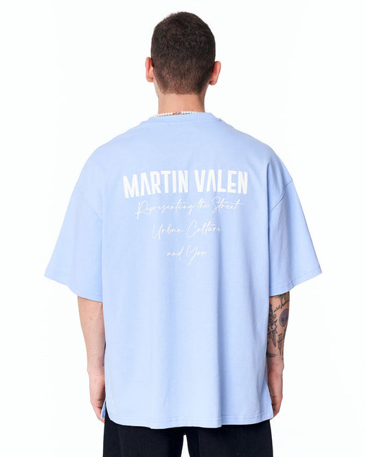 Martin Valen "Slogan" oversized blue men's T‑shirt back view with white upper-back print